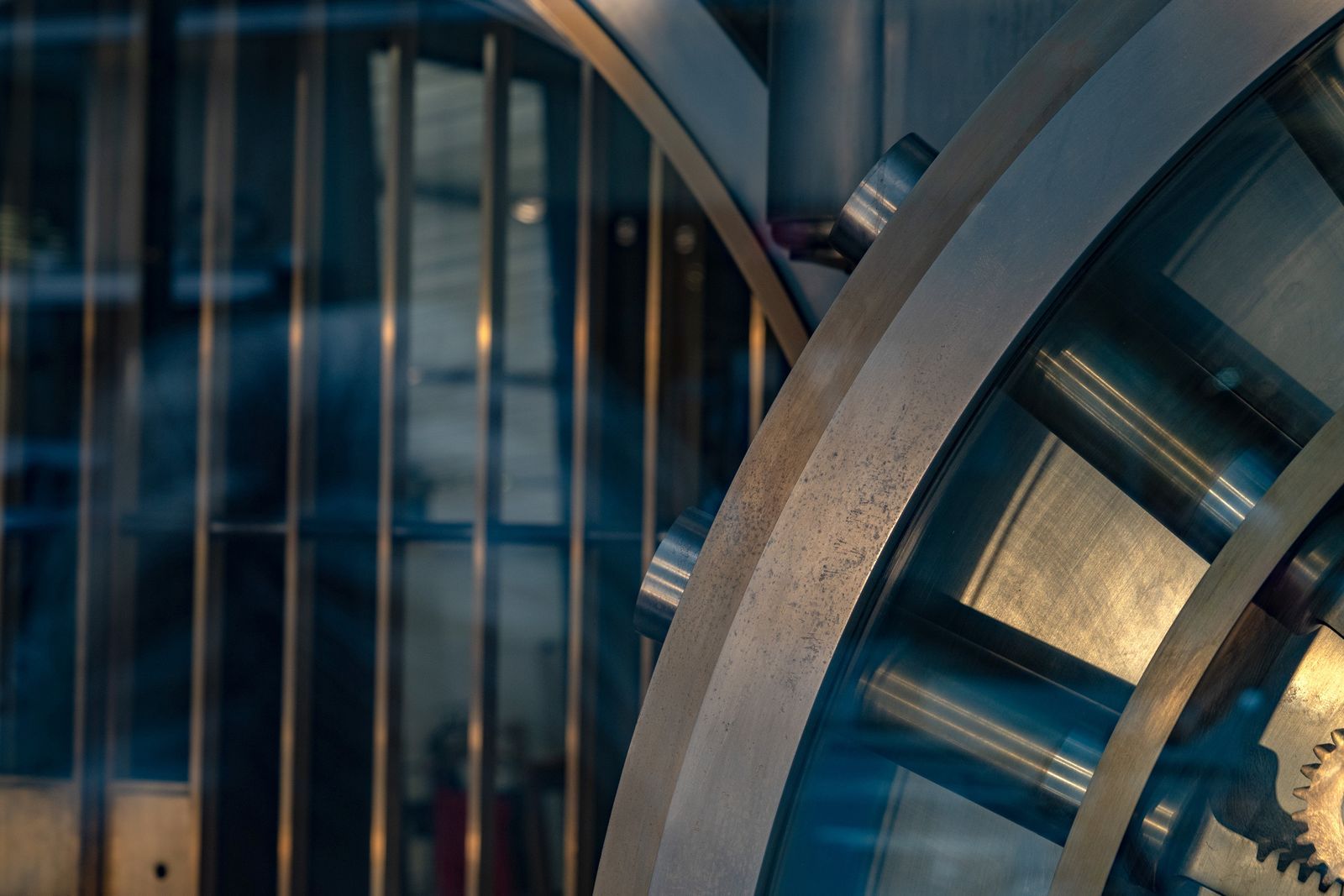 Closeup of a sophisticated vault door that is slightly open